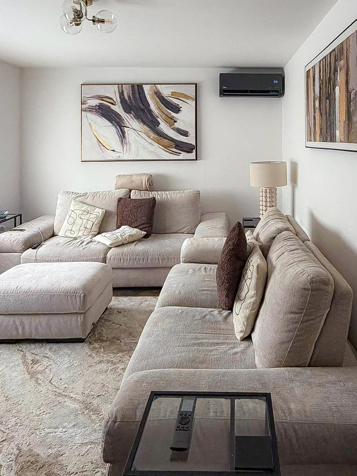 Modern Living Space - Multi-room installation featuring discreet high-wall units. by The Cooling Guy